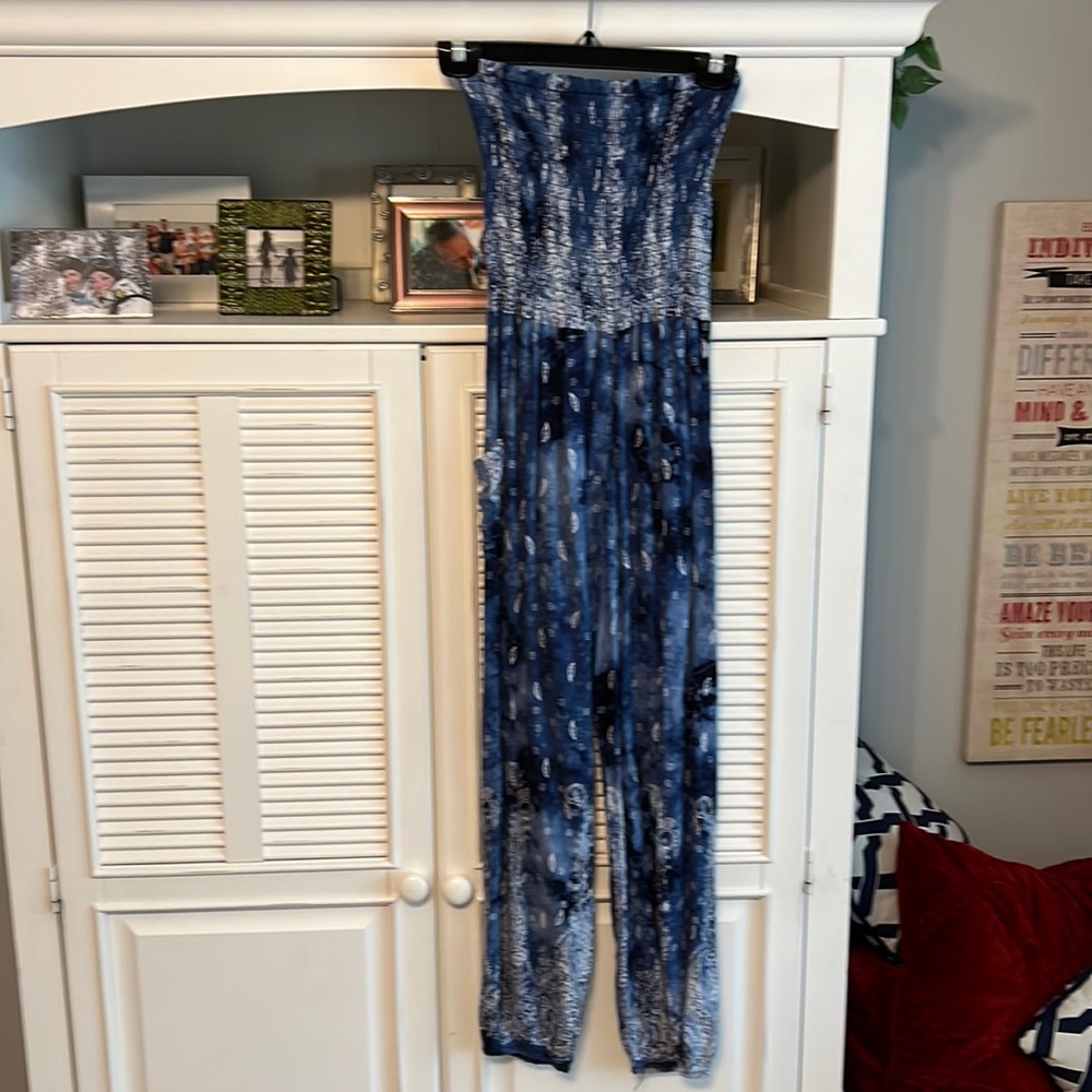 Strapless jumpsuit with smocking and Jeanie style pants.
